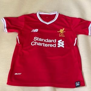 I have one more soccer shirt it's by the standard charger.